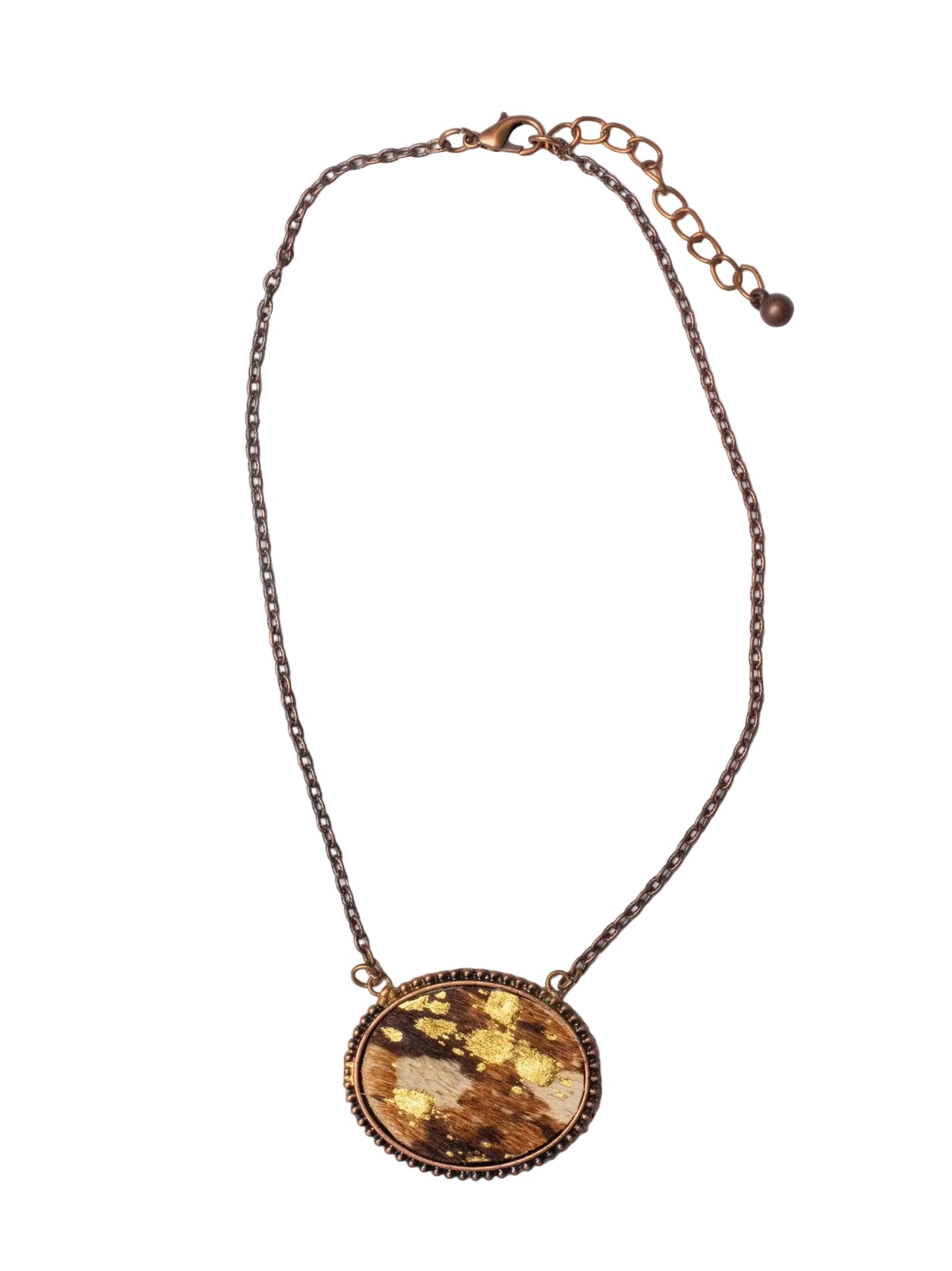A copper necklace with an oval cowhide feature on a white background.