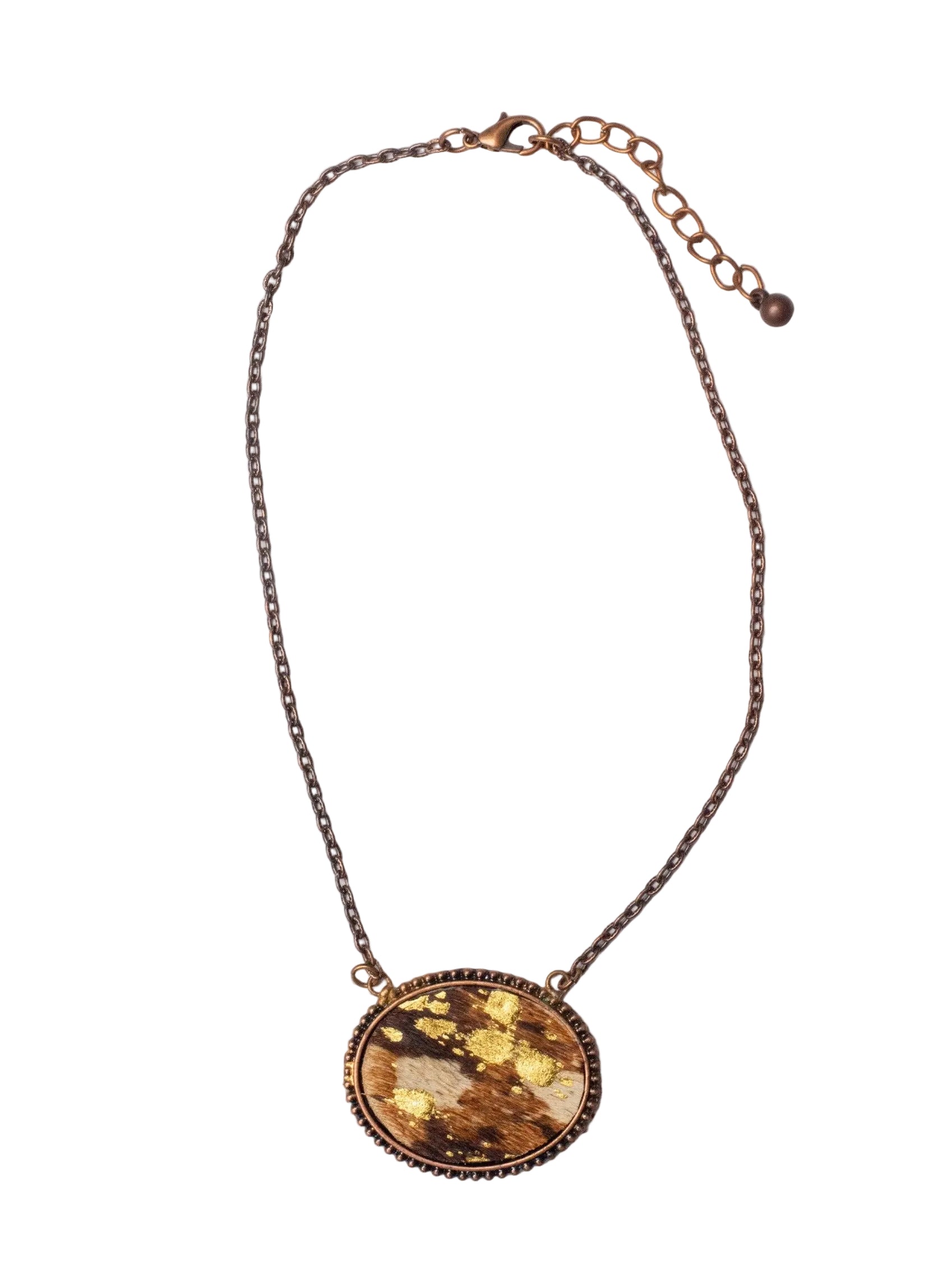 A copper necklace with an oval cowhide feature on a white background. 