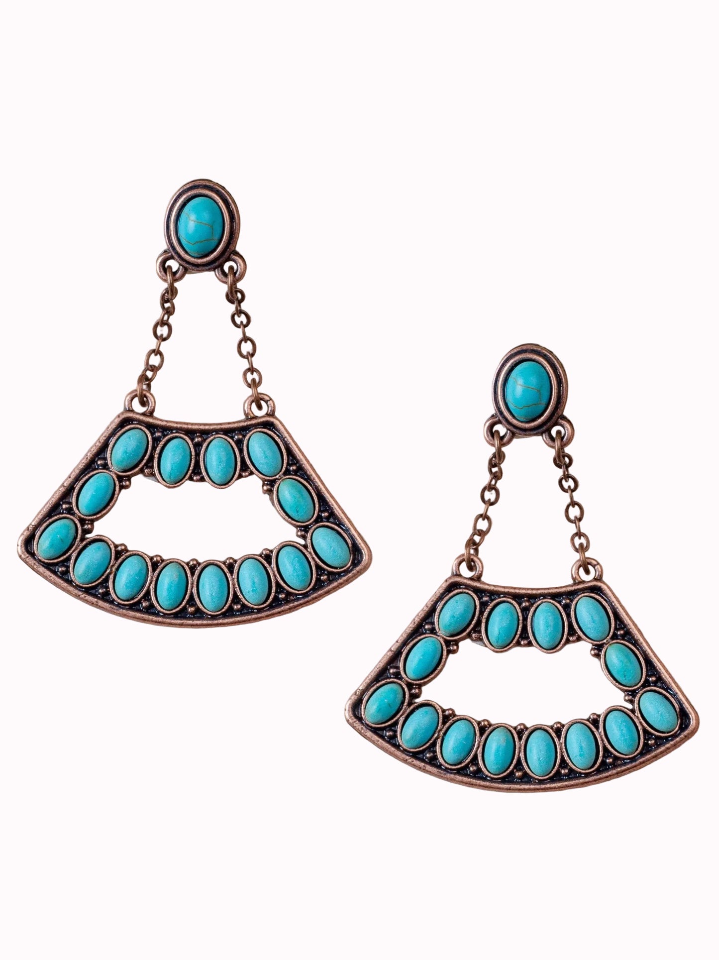 Turquoise earrings with bronze accents on a white background