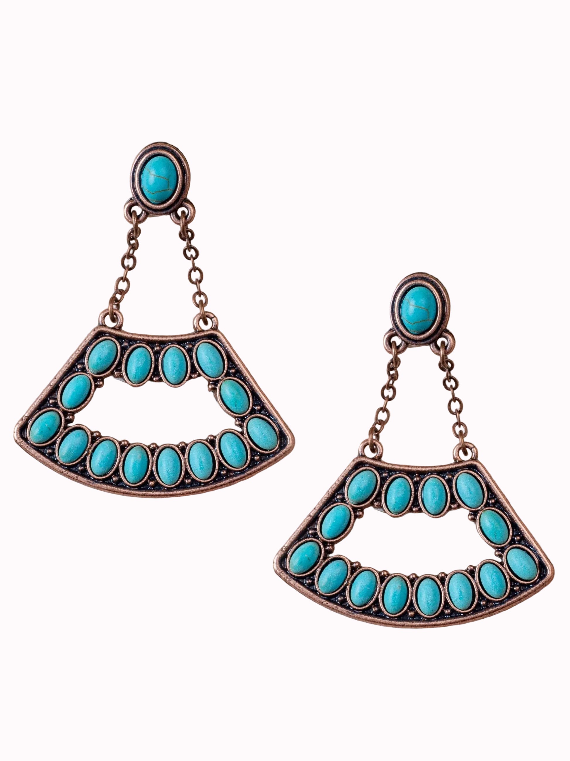 Turquoise earrings with bronze accents on a white background